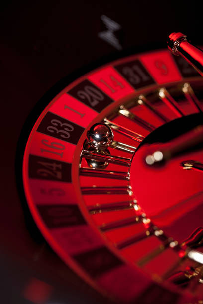 Live dealer studio with baccarat table and digital betting